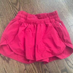 Red lululemon athletic shorts